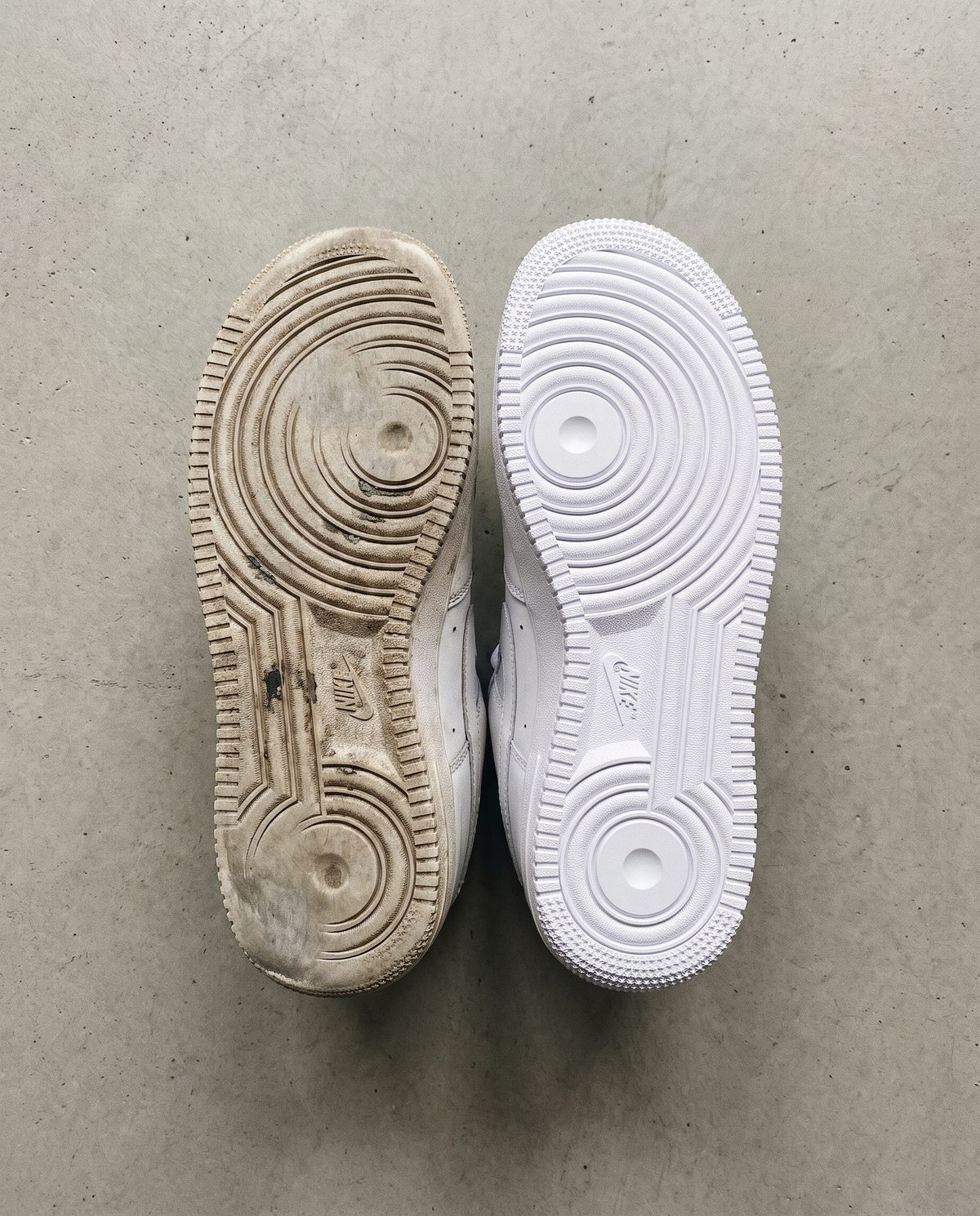 Two Air Force 1 outsoles side by side — one worn and yellowed after months without protection, one still factory white with a SneakerSoul protector on it